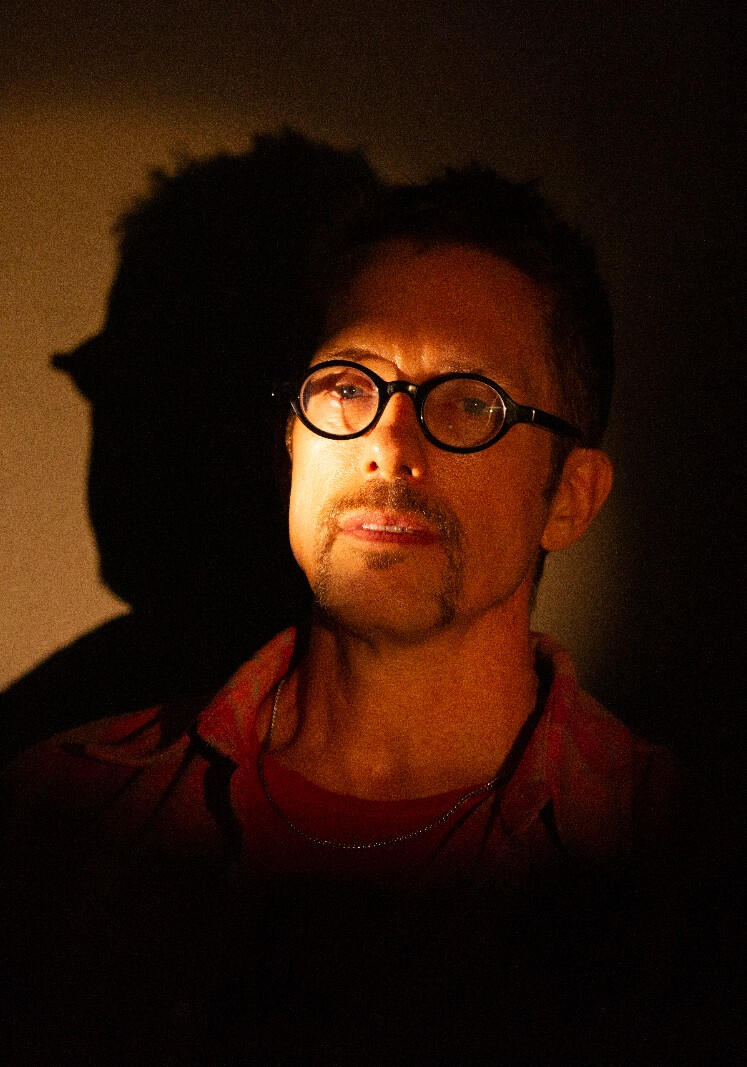 Portrait of sirdanpaul in warm low light, photo by Taylor Cullen